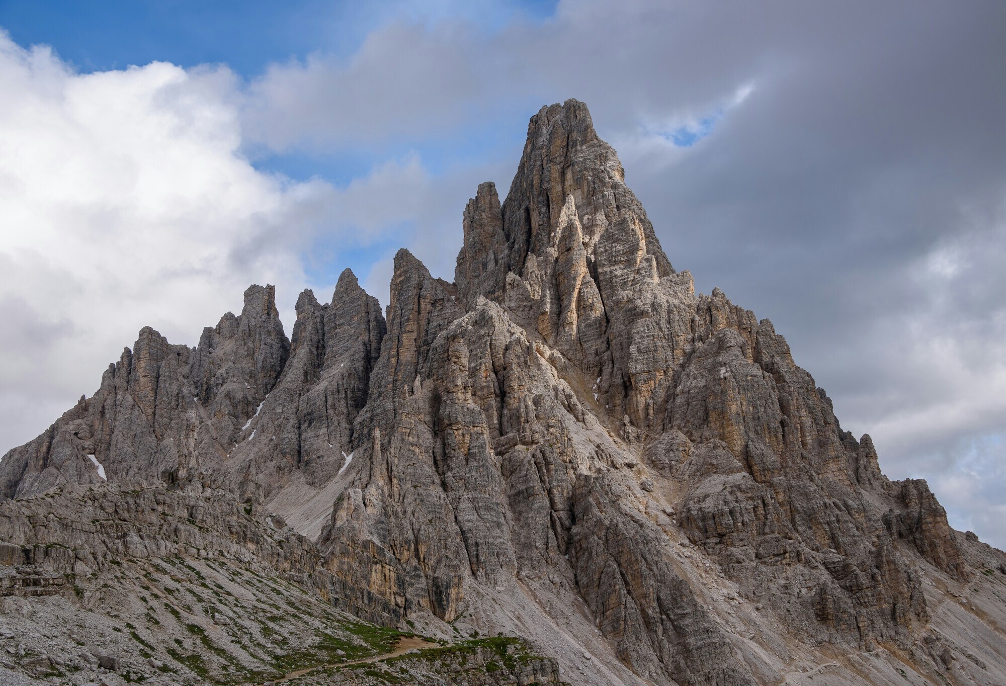 Rugged peak with towers and hiking trail