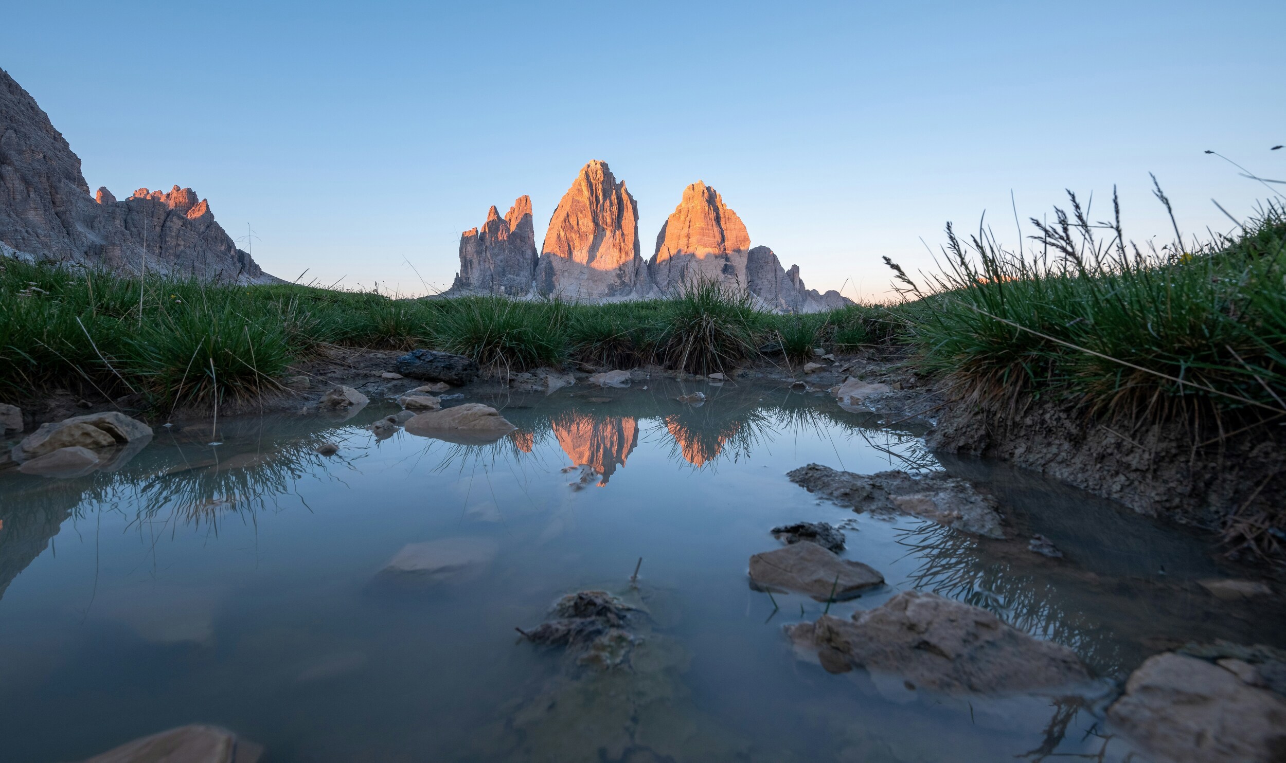 Mountains reflected in the water in the morning