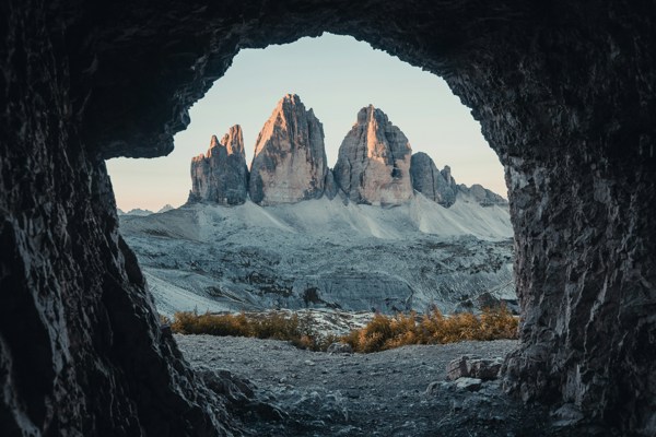 Three peaks seen from a hole in the rock