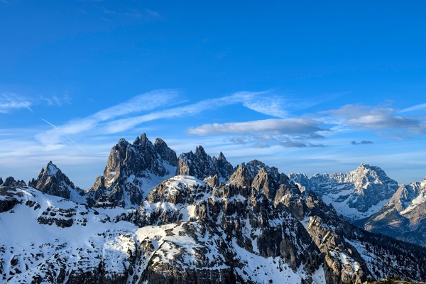 Rugged Dolomites peaks covered in snow