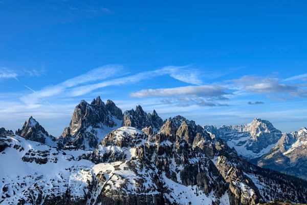 Rugged Dolomites peaks covered in snow