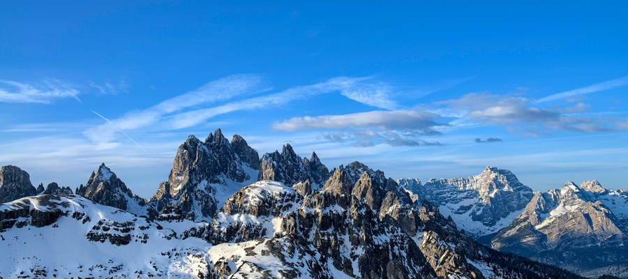 Rugged Dolomites peaks covered in snow