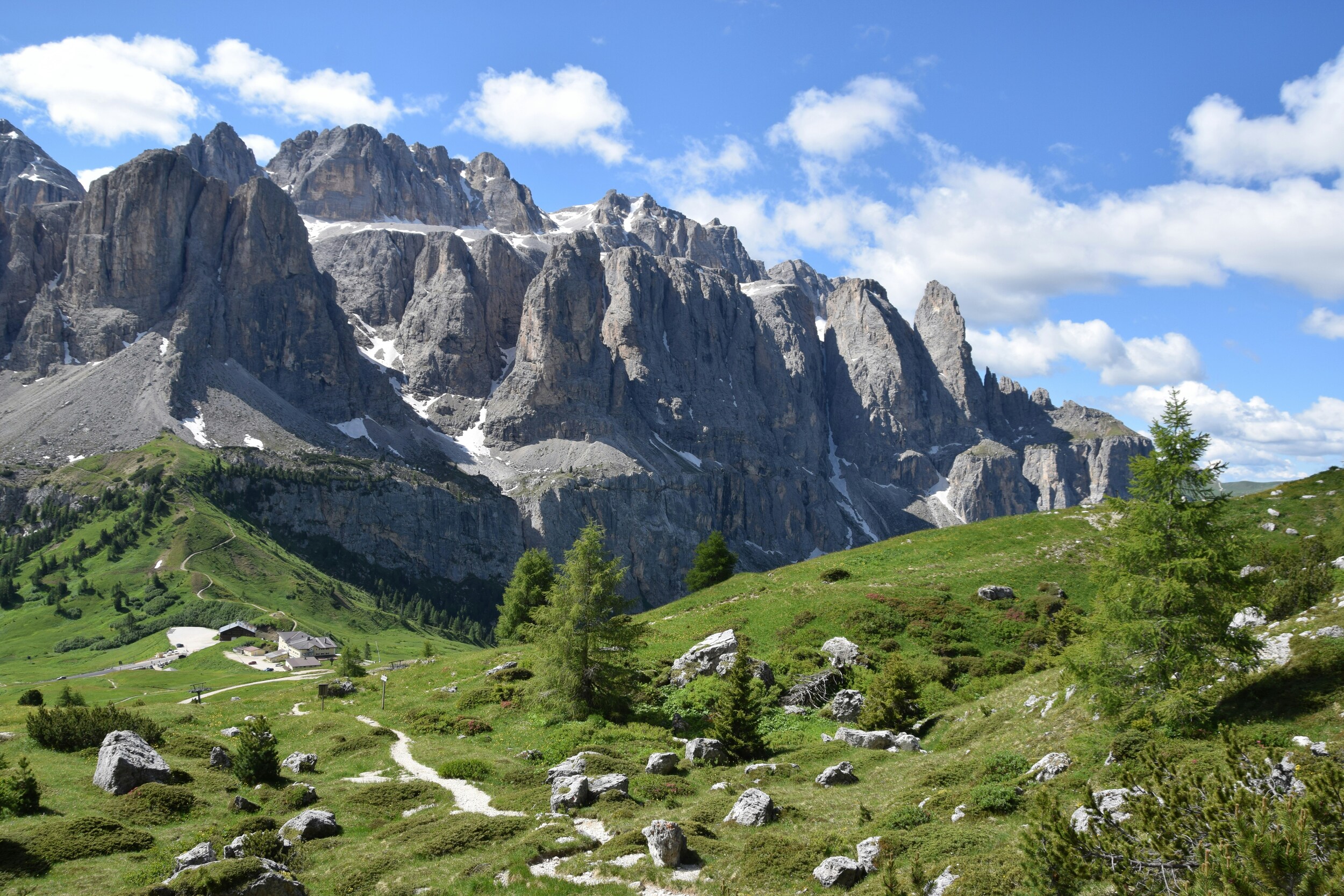 Pasture with hiking trail and mountain scenery