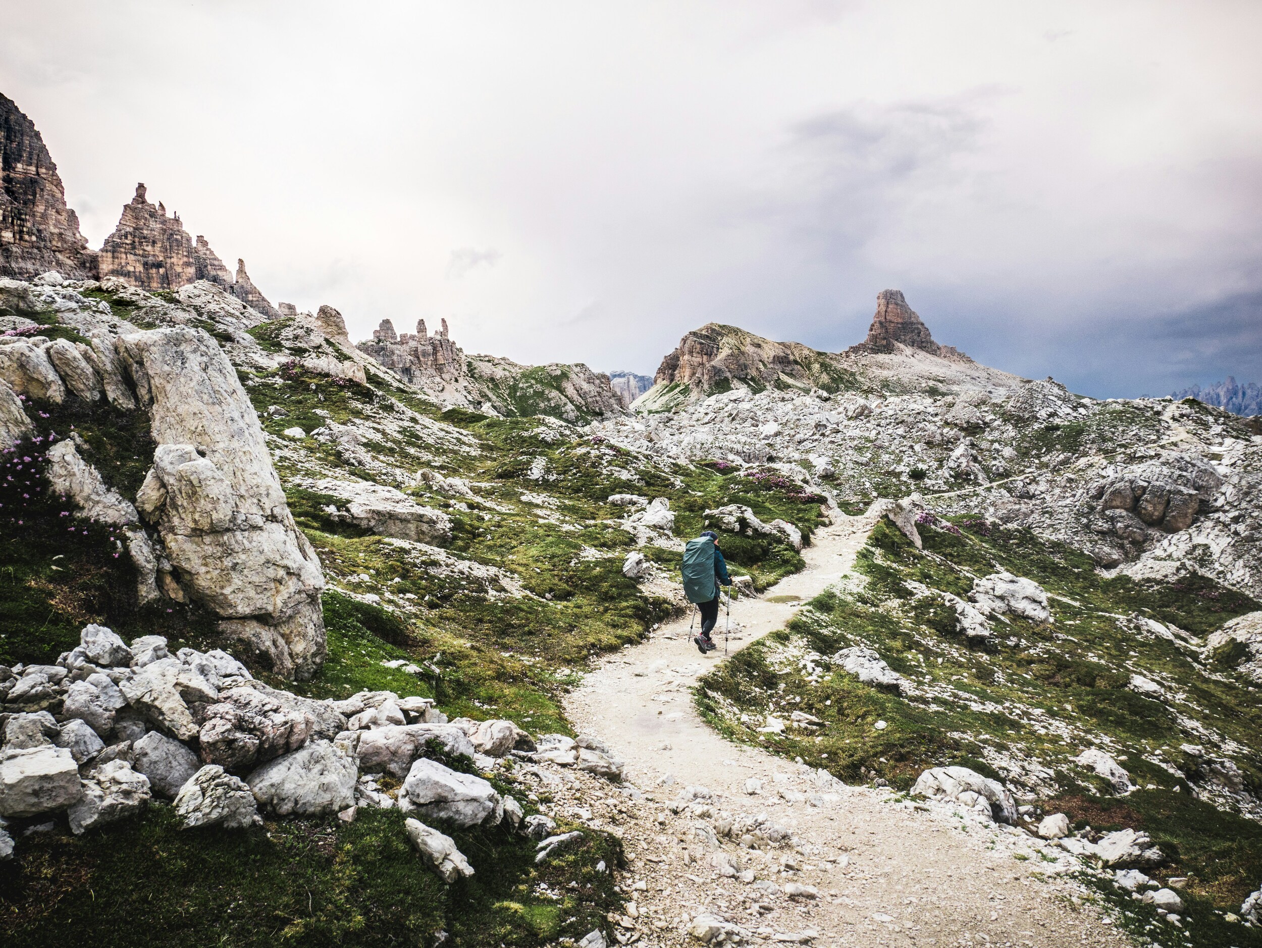 Hiker on a rocky trail in the mountains