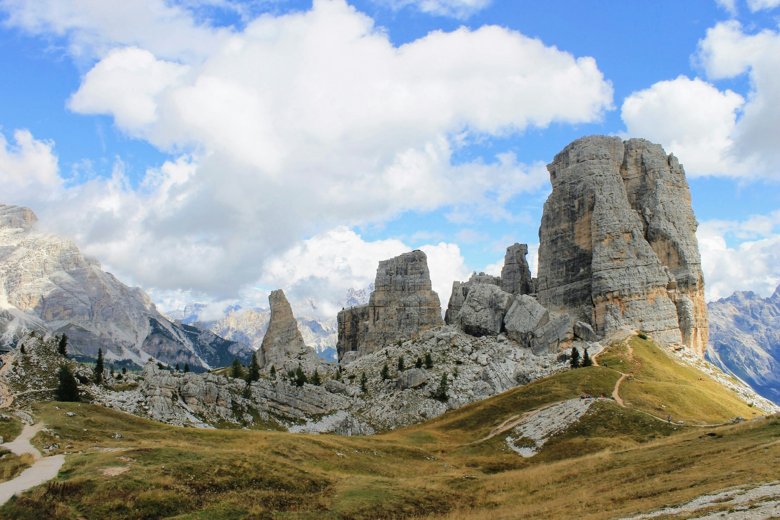 Single-standing mountain peaks and green meadows