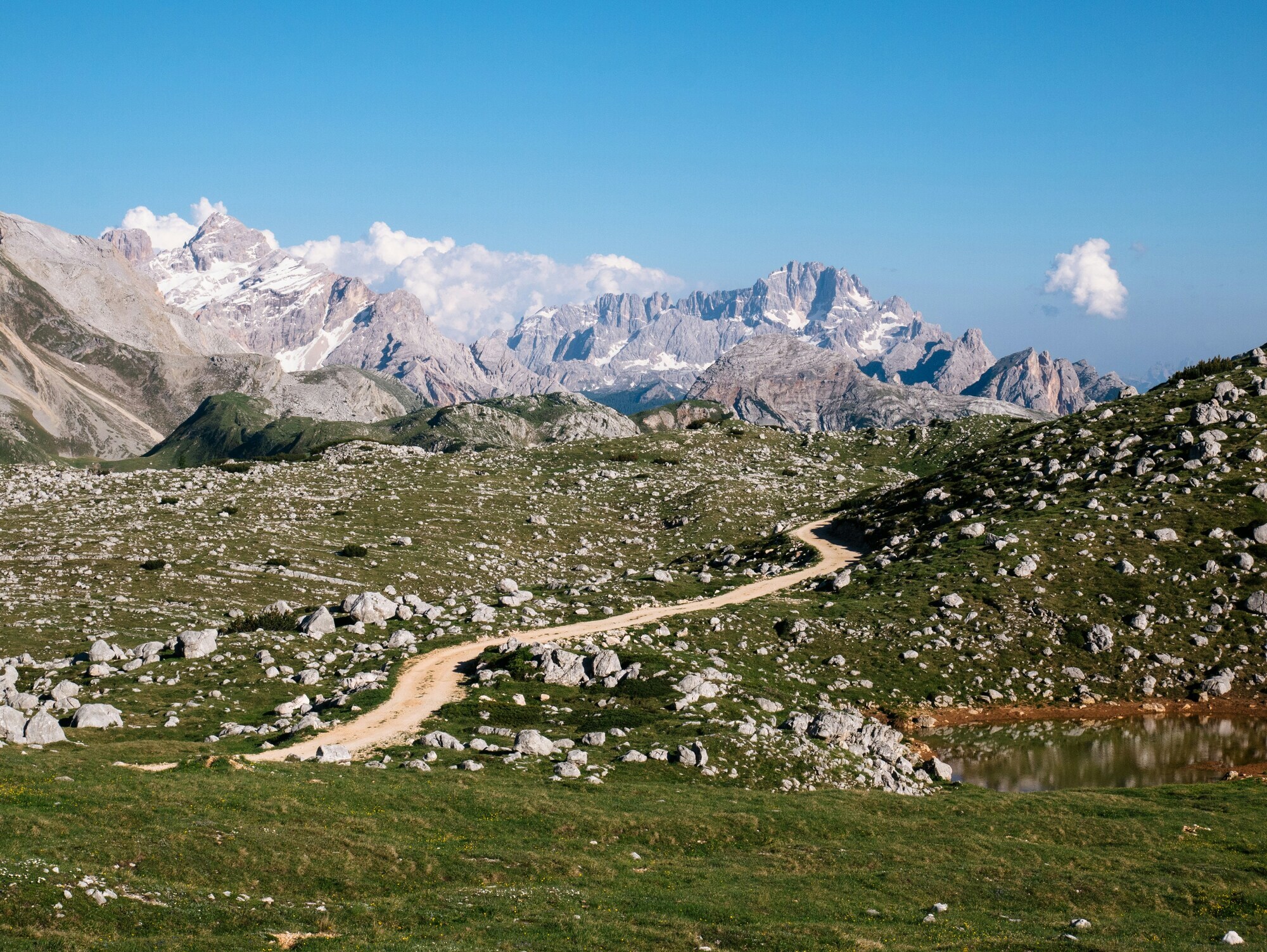 Hiking trail winds its way through a mountain landscape