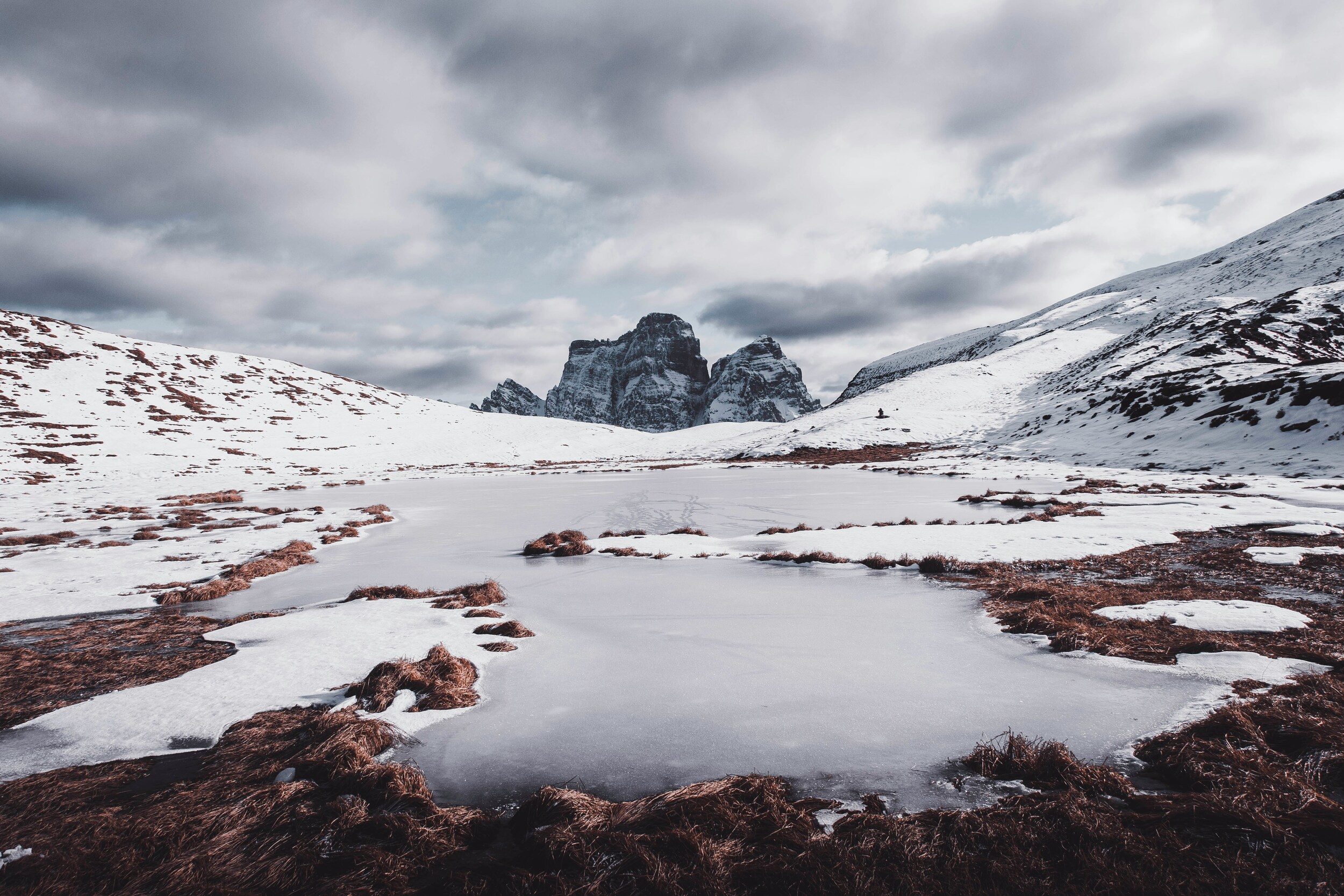 Mountain behind a small frozen lake