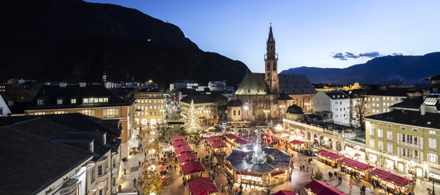 Christmas market in the city center by night