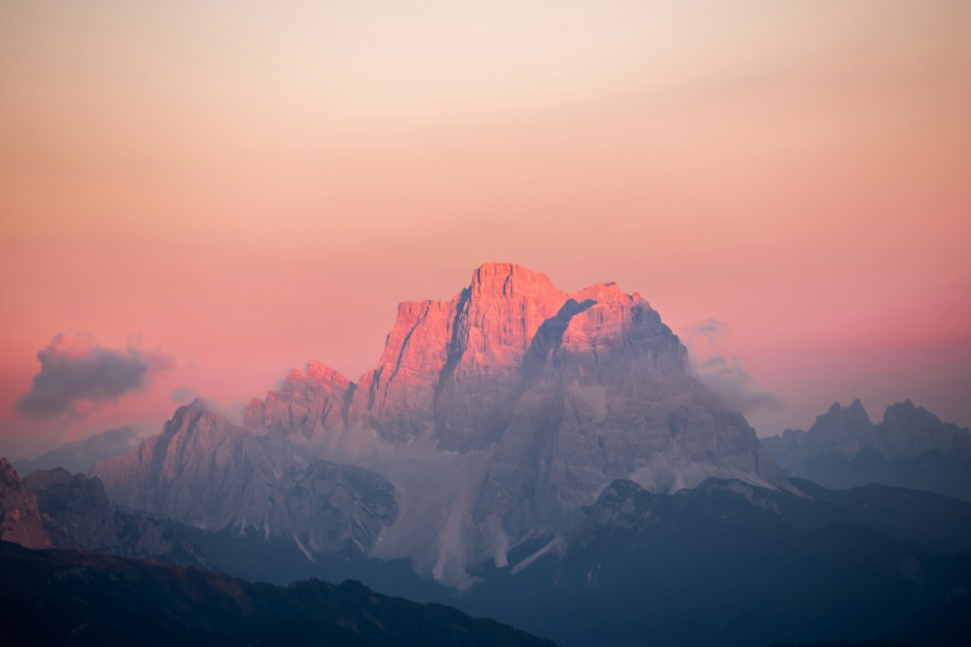 Giant grey rock in pink evening light