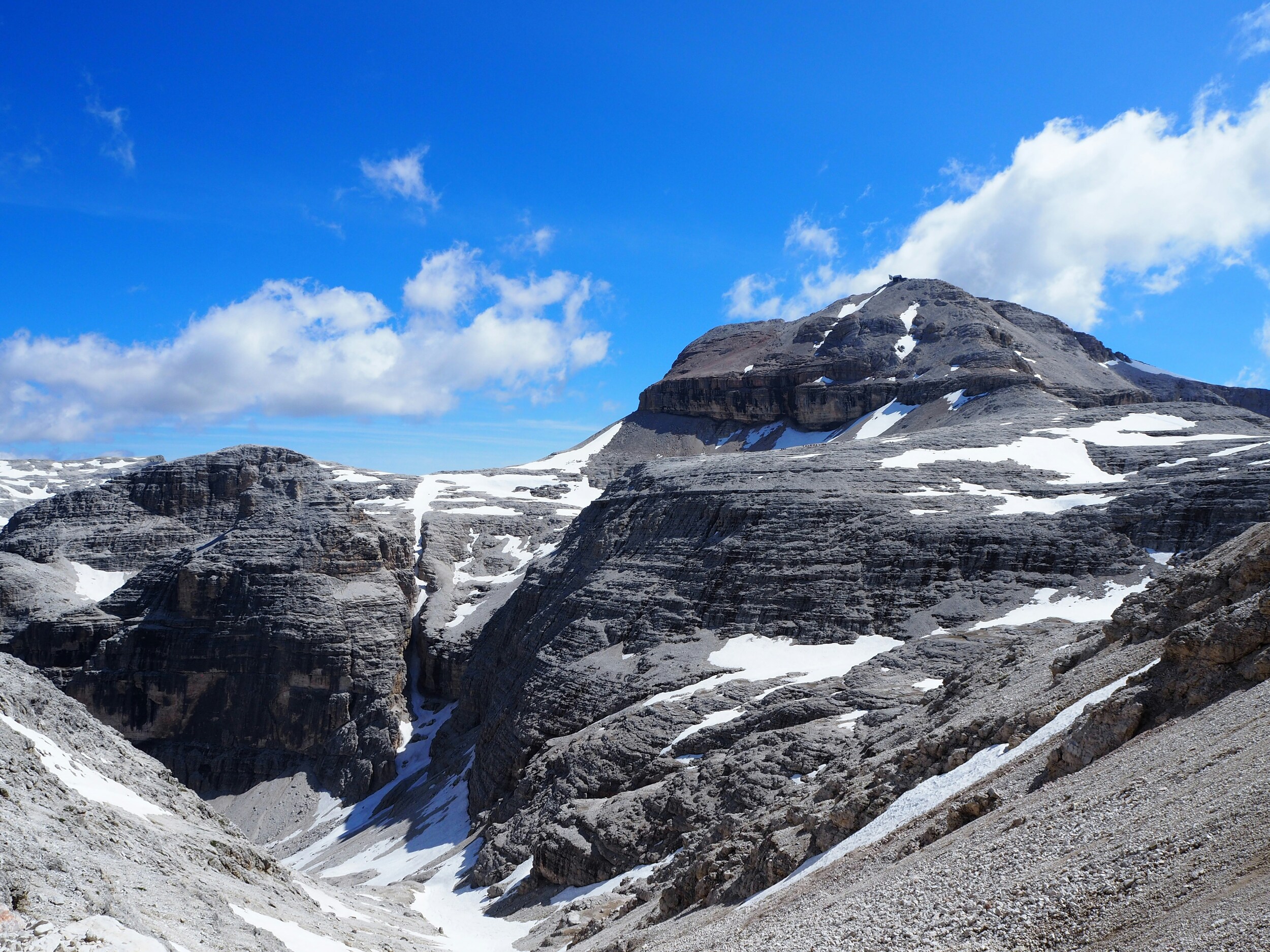 Steep rocks, partially covered in snow