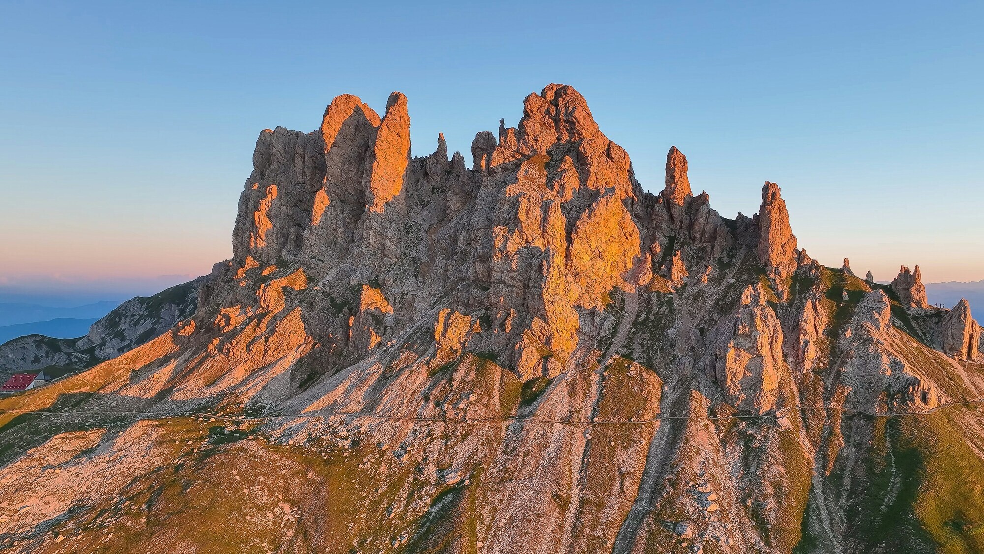 Pointed rock towers in the light of the rising sun